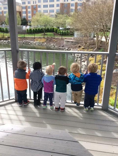 Children looking at the pond at Westminster Canterbury Richmond in Richmond, VAL